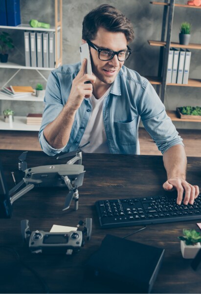 A man using a computer to analyze financial data, representing the work of CPAs in California.